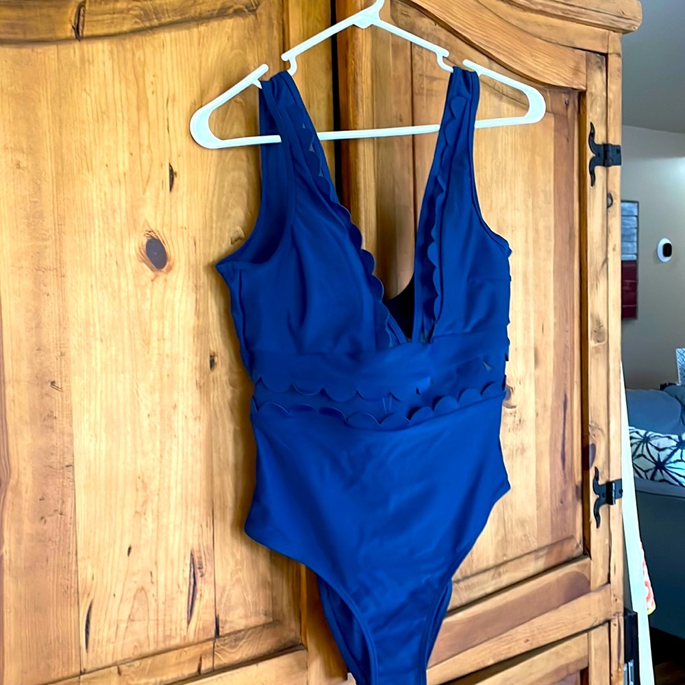 Navy one piece with scalloped edges